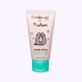 Front view of the Pusheen hand cream. The light pink squeeze tube has a light green snap close lid so that the tube can stand upright.