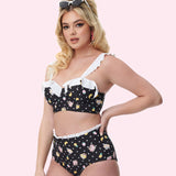 Model is turned to the side while wearing the Pusheen Bikini Set. The top edges of the swimsuit have white ruffle details on the edges.