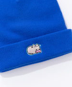 Close-up view of embroidery on the Gaming Pusheen Knit Hat. Pusheen is featured in her classic grey and light brown coloring. The cat holds a light pink gaming controller. The cat is outlined in a light teal thread.