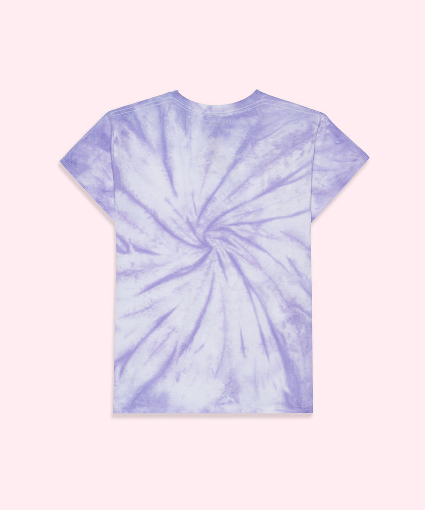 The backside of the Hello Kitty x Pusheen Purple Unisex Tee on top of a light pink surface. The light purple and white tie dye effect continues to the back of the tee.