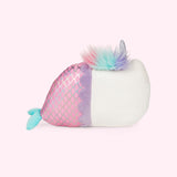 Back view of the Magical Lights Mermaid Pusheenicorn Plush in a light pink space. The fluffy mane starts around the unicorn horn and ends right at the start of the tail, making it look like a fuzzy caterpillar. There are no additional details on the back of the plush. 