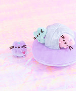 The Mini Lilac Pusheen takes the first steps onto the holographic ground while the Mint and Pink Pusheen look on from the safety of their plush ship. The mini plush when up next to the plush UFO only go up to the top of the purple plush circle. 