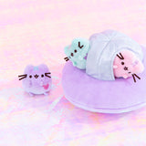 The Mini Lilac Pusheen takes the first steps onto the holographic ground while the Mint and Pink Pusheen look on from the safety of their plush ship. The mini plush when up next to the plush UFO only go up to the top of the purple plush circle. 