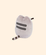 Back view of the plush shows Pusheen’s classic back stripes and striped grey tail.