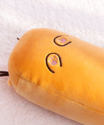 Close-up view of the paw pad embroidery on the underside of the bread plush. The thread is black and pink. The brown whiskers on the front side of the plush can be seen extending off the body in this view.  