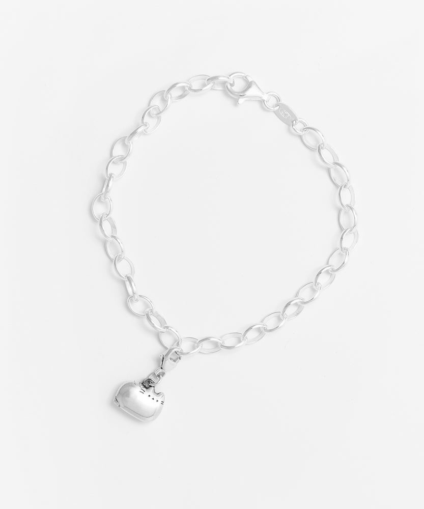 Close up of the Silver Charm Bracelet. The Pusheen charm is attached to the bracelet with a lobster clasp, allowing it to be removed and rearranged as desired.