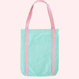 Back view of Pusheen Deluxe Tote Bag. The mint tote bag has pink handles that extend down the entire body of the bag. 