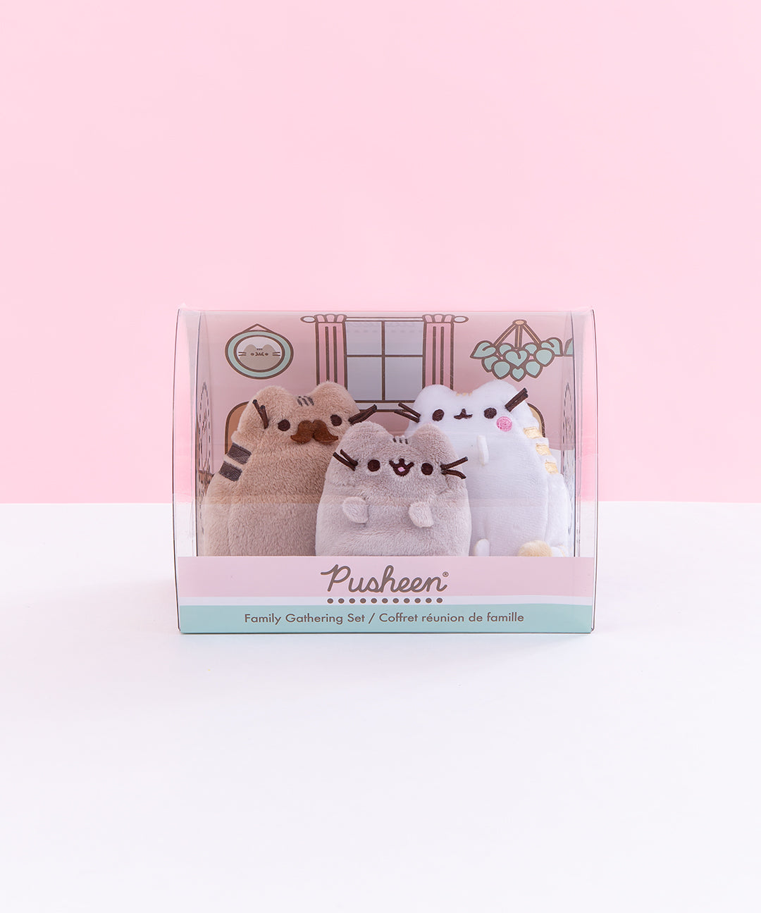 Front view of the Family Gathering Plush Collector Set in front of a pink background.