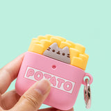 Hand holding Pusheen French Fries Airpods Case for Airpods 1 & 2. Pusheen sits in a fry basket surrounded by french fries.