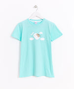   Hung on a white hanger, the Marshmallow Dreams Pajama Tee is hung out to show the full length of the t-shirt. The mint tee has printed graphic on the front center of the tee shirt.  