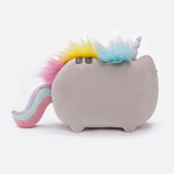 Back view of the Pusheenicorn plush, standing in a white space. The back of Pusheen’s right ear is completely covered by the blue tuft of the mane. The other side of Pusheen’s head and back stripes are still visible from the back. 