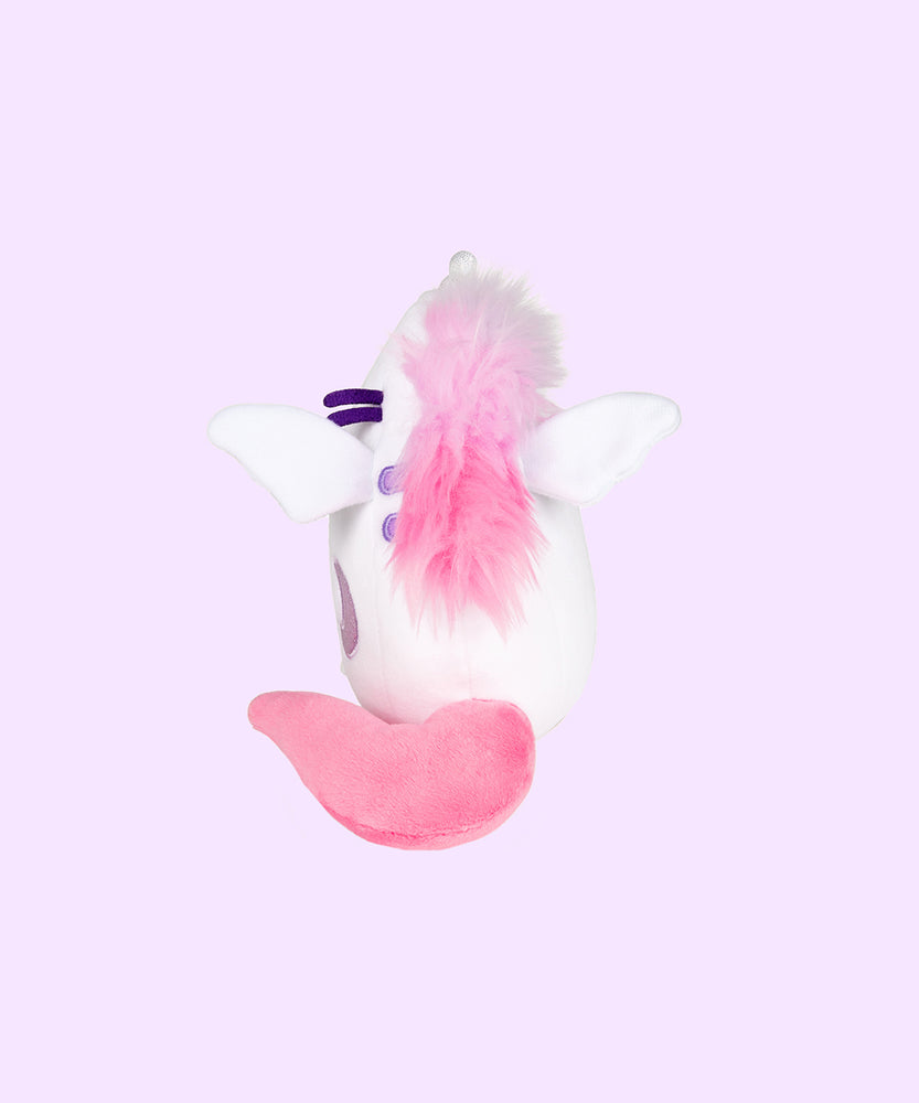 Side view of the Super Pusheenicorn Squisheen. Pusheen’s fluffy mane goes down from her ears and over her back purple stripes. Super Pusheenicorn has one plush wing on the front and the back.