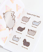The interior of the book, showing off the ‘Types of Cat tails’ comic with Pusheen, Stormy and Pip. On the left page is an illustration of Pusheen leaping in front of a pattern of pizza slices.