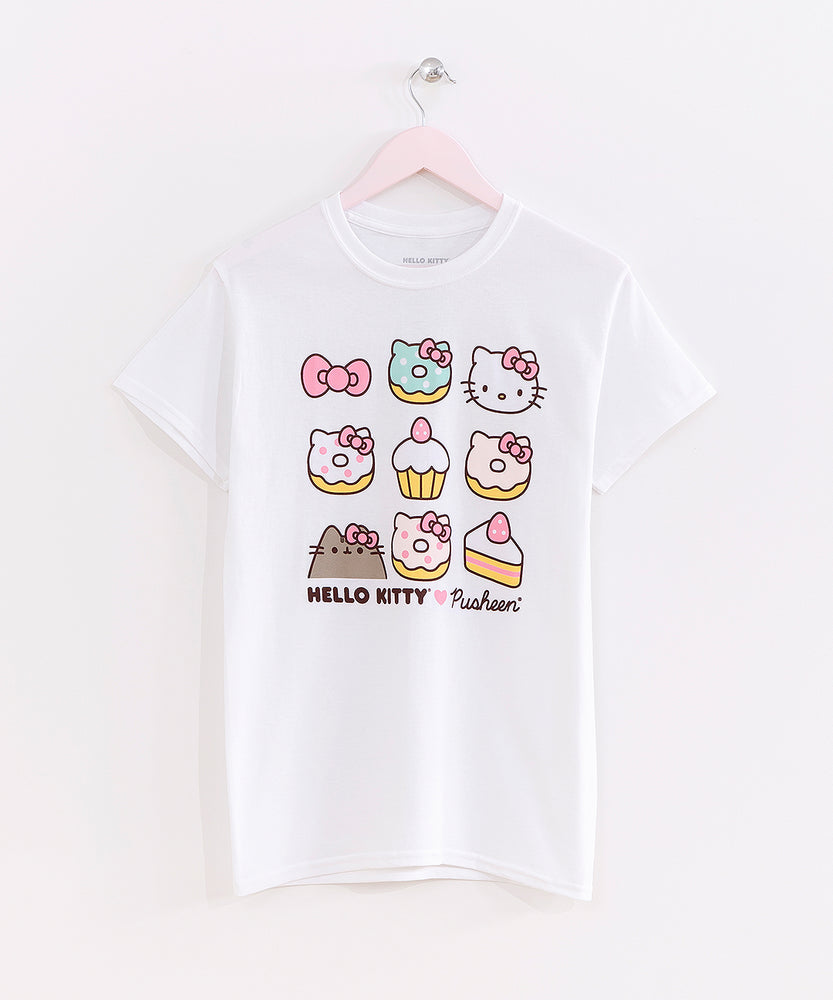The HK x Pusheen tee hanging on a clothes hanger in front of a white background.