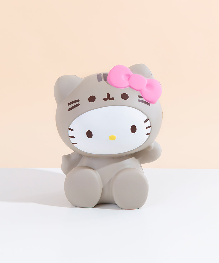 Front view of the Hello Kitty Jumbo Squishy seated on a white floor in front of a pale yellow background.